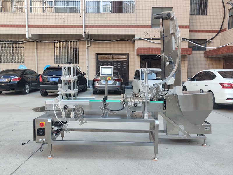 江蘇星火自動壓蓋封口機