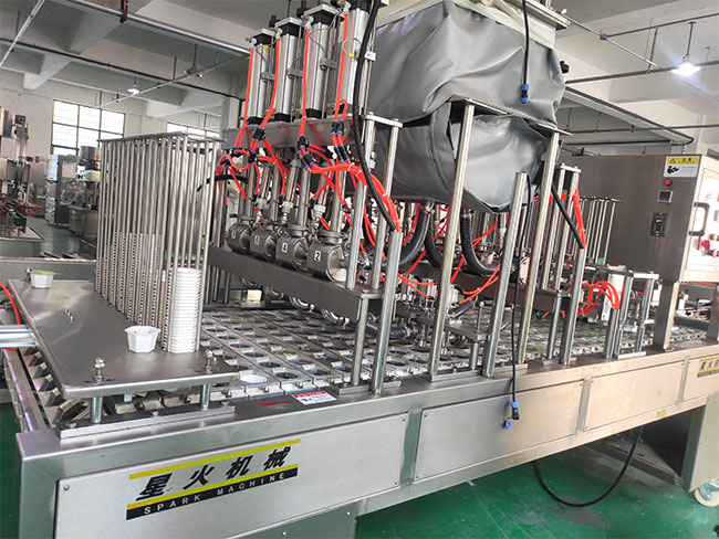 星火全自動灌裝封口機設(shè)備展示